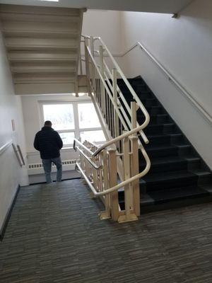 Staircase from rear oarking area