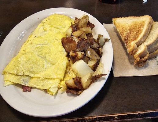 Meat lover omlette with potatoes