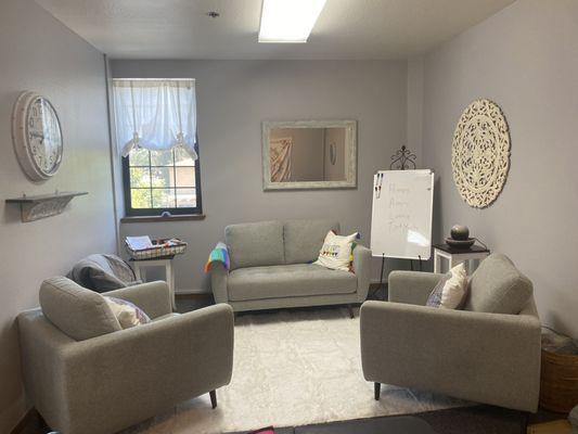 My therapy office offers a peaceful and comforting atmosphere, with soft lighting and gentle colors that create a sense of calm.