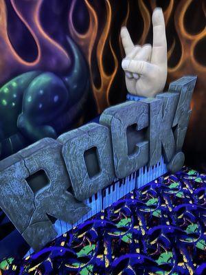 Rock of Ages black light mini golf