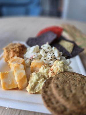 Miscellaneous cheeses, crackers, tortillas, hummus, egg salad, pasta salad ...