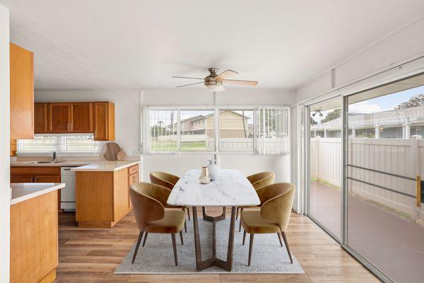 Dining room area with open kitchen.