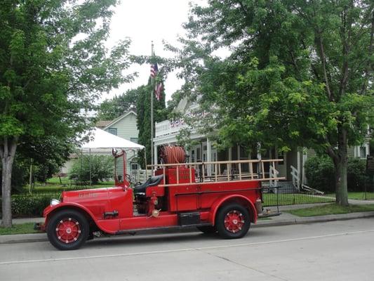 Andrew J Volstead House Museum with Granite Falls fire truck converted from a bootlegger's vehicle.