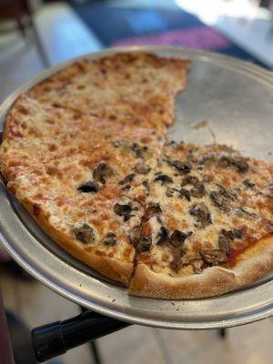 Pizza half onion and half mushroom