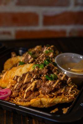 Juan Tacos
Mama noodles in a crispy wonton shell with cream cheese and a choice of protein. chicken · pork belly · brisket