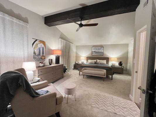 Newly remodeled bedroom with soffit gone and a faux ceiling beam