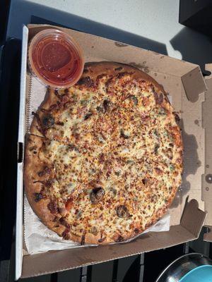 Medium veggie pizza extra cheese