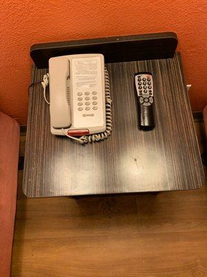 The landline phone and the television remote control in my room.