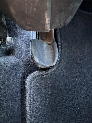 Dirt and grime on back of the driver seat