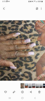 Beautiful lilac sparkle nails.