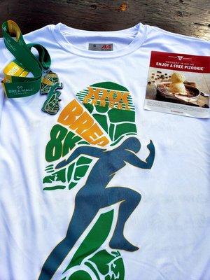 Tech t, medal, and free pizookie coupon allowed at any BJ's location with minimum