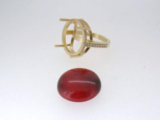 Rhodonite cabochon I cut and polished for a local jeweler