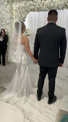 A picture of my dress with the shorter train that I had requested.