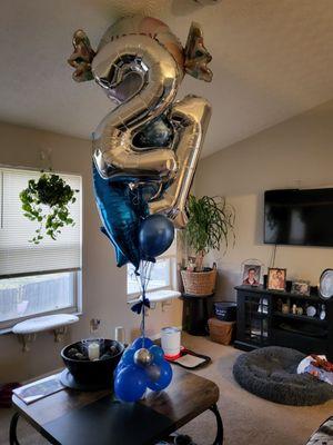 My mother's birthday balloons. I was playing a joke on her 63rd birthday saying it was merely the "third anniversary" of her 21st :-D