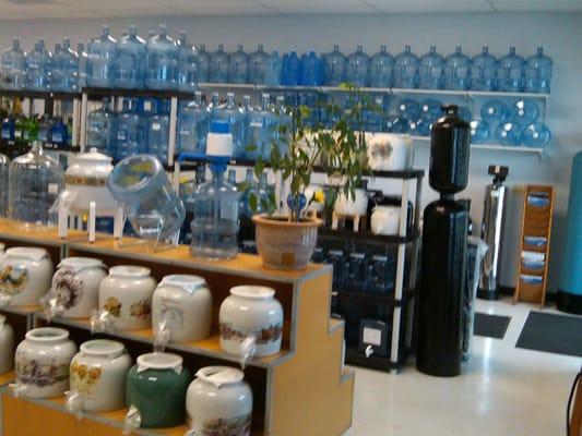 Lots of bottles, crocks and accessories