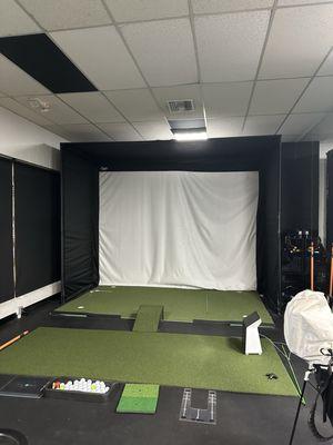 Golf simulator bay