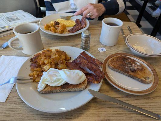 Poached, crispy bacon, rye toast and home fries. Mmmmmm!