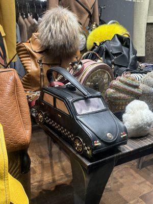 The novelty, non-leather purse, the salesman tried to over charge me for--$90, when he assumed I was a tourist.