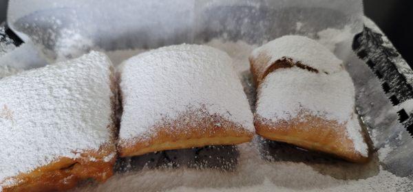 Beignets trio. One basic and two stuffed.