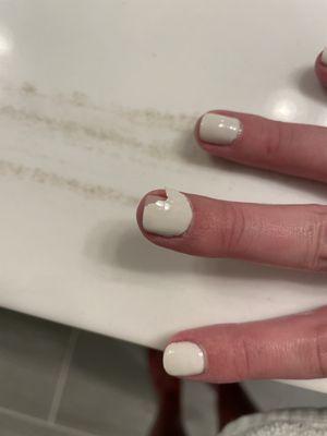 Lifted gel polish one day after getting my nails done