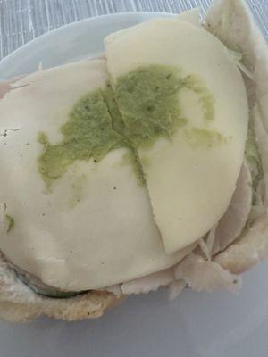 Horribly made sandwich with barely any avocado.