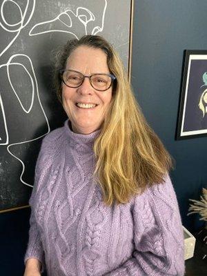 Happy customer after having a Brightening facial!