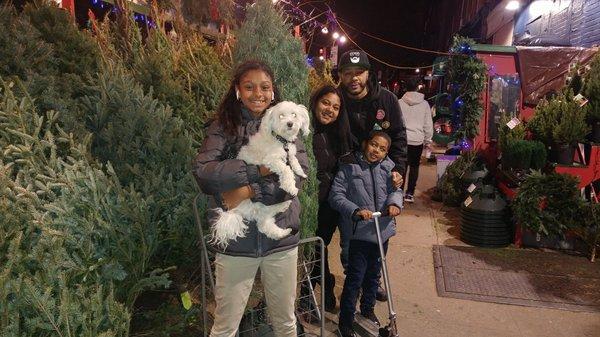 Happy family with their new tree!