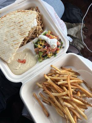 Chicken Shawarma platter with a side of fries and they're amazing garlic sauce!