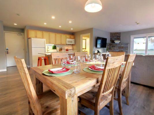Dining table and kitchen island in our suites.
