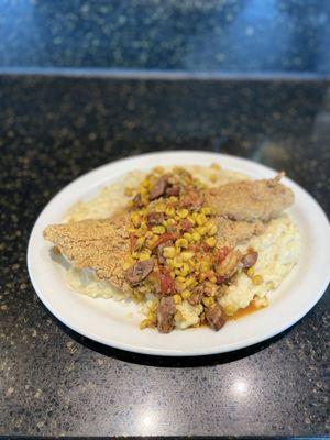 Fish and grits with a corn and crawfish relish