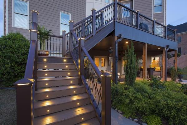 This picture depicts a true Trex Premium Deck. This deck features Lighting, Transcend Decking and Railing, Drainage System, a...