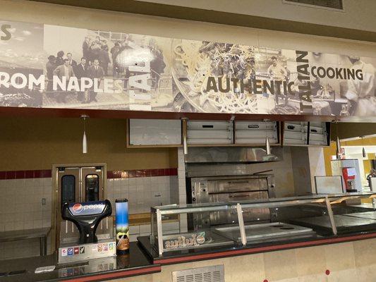 Another vacant place, ghost town vibes in the middle of the food court. Lower rent is better than an empty and abandoned mall.