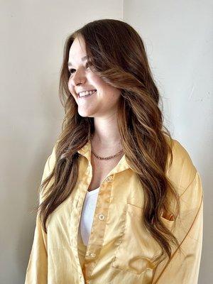 Two rows of handtied hair extensions to add length and volume to the hair