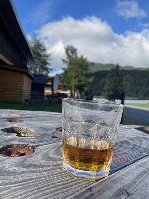 A bulleit neat by the lake