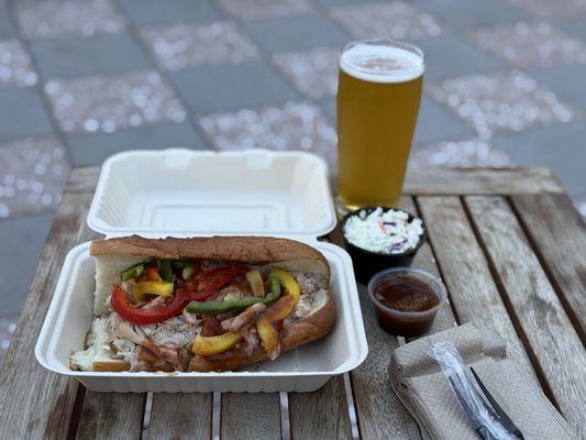 Chicken sandwich with side of coleslaw- beer from Hop Dogma in Half Moon Bay