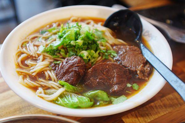 Tender beef shank, hearty noodles, and fresh vegetables in a rich, savory broth.