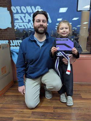 Miss Mea modelling our HERO Card for kids building Courage at home.