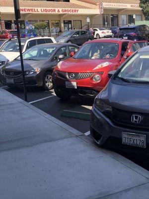 Building in center. Parking lot is full!