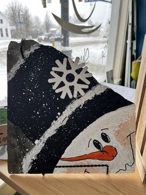 Local artist, Dee Banta sells her beautiful creations on recycled slate and other repurposed building materials