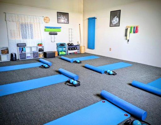 Small group mat classes. Limited to 5-6 students to allow for individual attention and corrections.