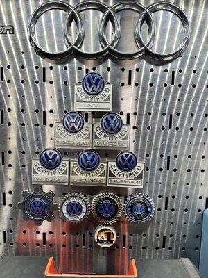 Volkswagen factory certification badges.