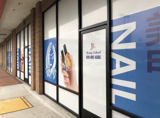 JCL beauty school window perforated vinyl