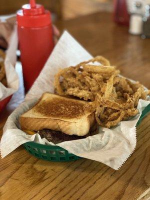 Patty Melt with cheese and onions.