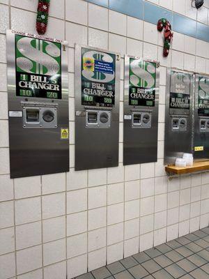 Bill changer with cups for the quarters