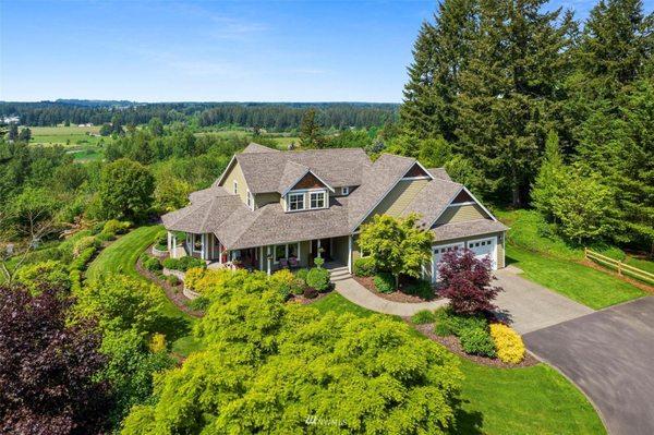 Gorgeous custom home atop the best view you can get in Tumwater!