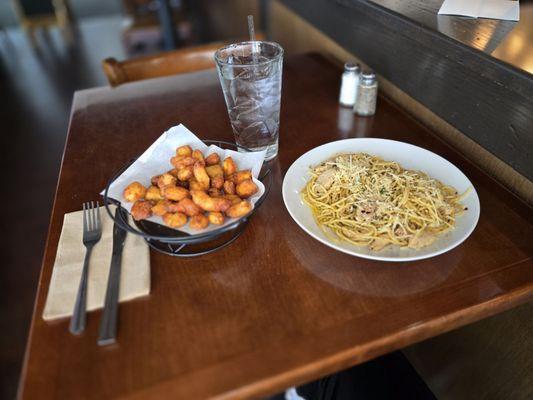 Cheese curds, spaghetti aglio e olio (spaghetti with garlic and oil)