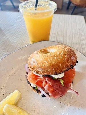 Salmon bagel with fresh orange juice...
