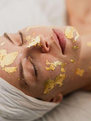 Experience the pinnacle of skin rejuvenation with our 24K Gold Facial i