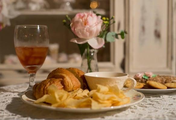 Chicken salad Sandwich with potato soup.