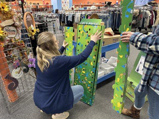 New variety of party glasses being set up by some of our expanded team!